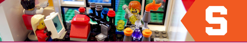 graphic of lego people assembling a laboratory