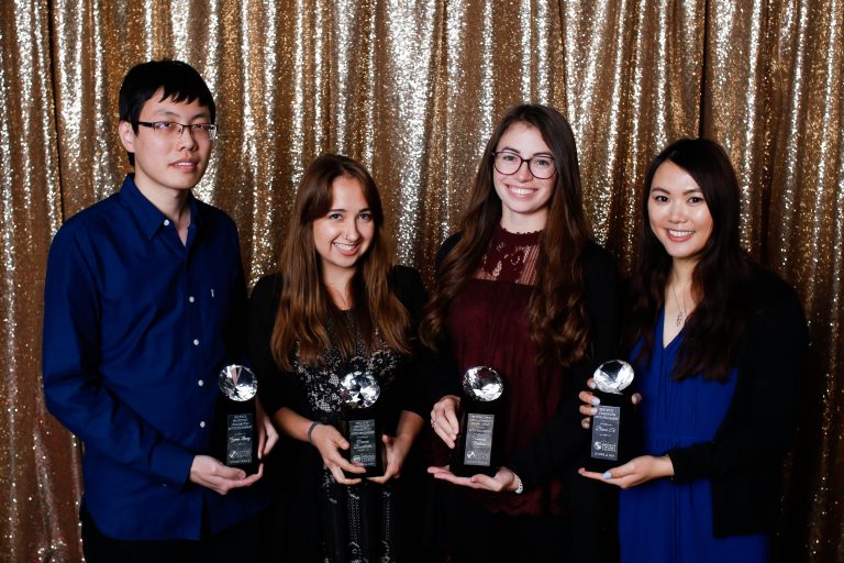 Deanna Broadwater, second from left holding silver awards