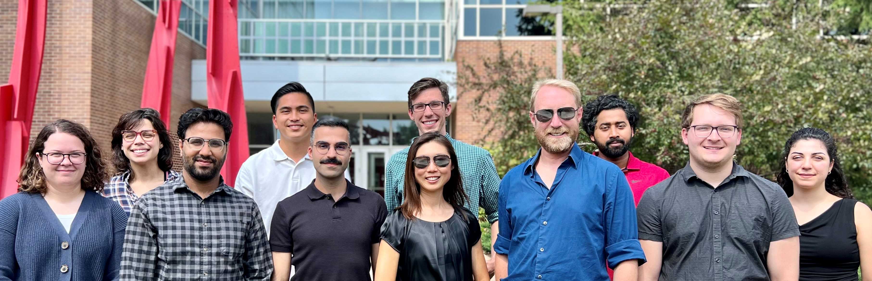 2023 Lunt lab Group photo of the sophia lunt lab outside a building on MSU campus