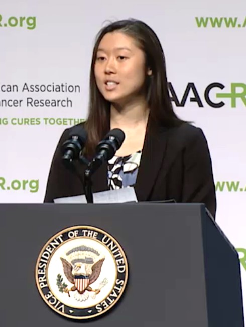 Dr. Lunt introduces Vice President Joe Biden and Dr. Jill Biden at the AACR Annual Meeting at a podium
