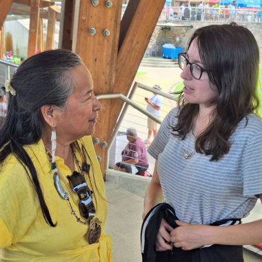 Rachel Passage speaks with Gun Lake councilwoman, Phyllis Davis.