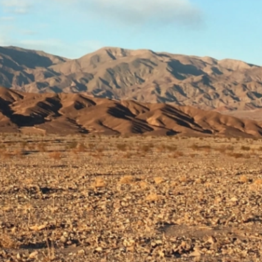 Death Valley vistas; dry earth and mountains.