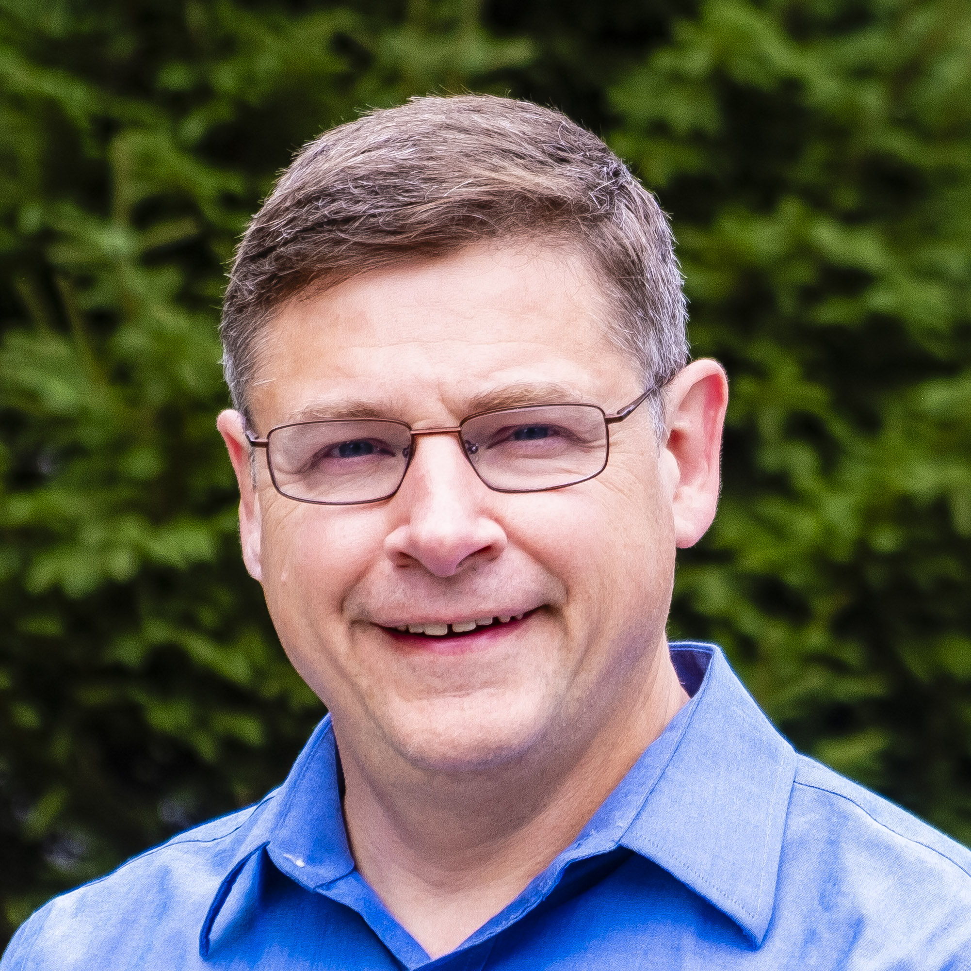 Headshot of Sean Weise in an outdoor setting